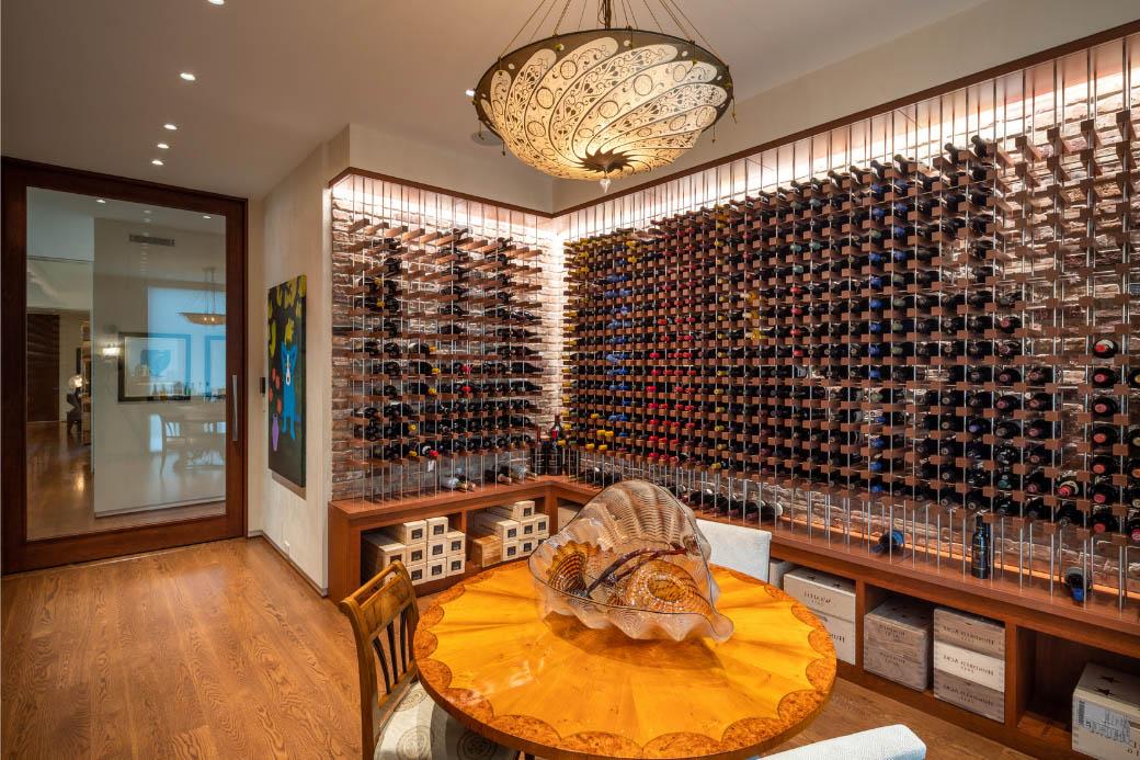 Brightly lit wine cellar with tasting table